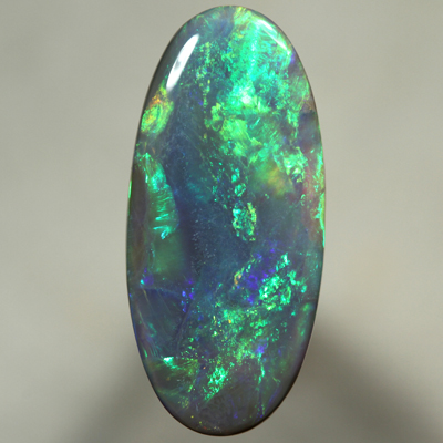 SOLID SEMI BLACK OPAL Large, quality opal with bright rolling flashes. SEE VIDEO